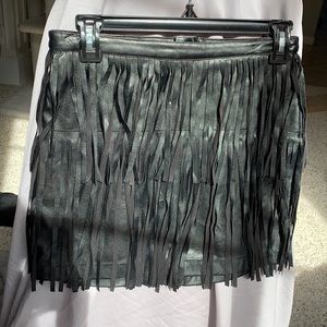 Black faux leather skirt. Rocker chick